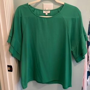 Umgee green blouse with flutter sleeves.